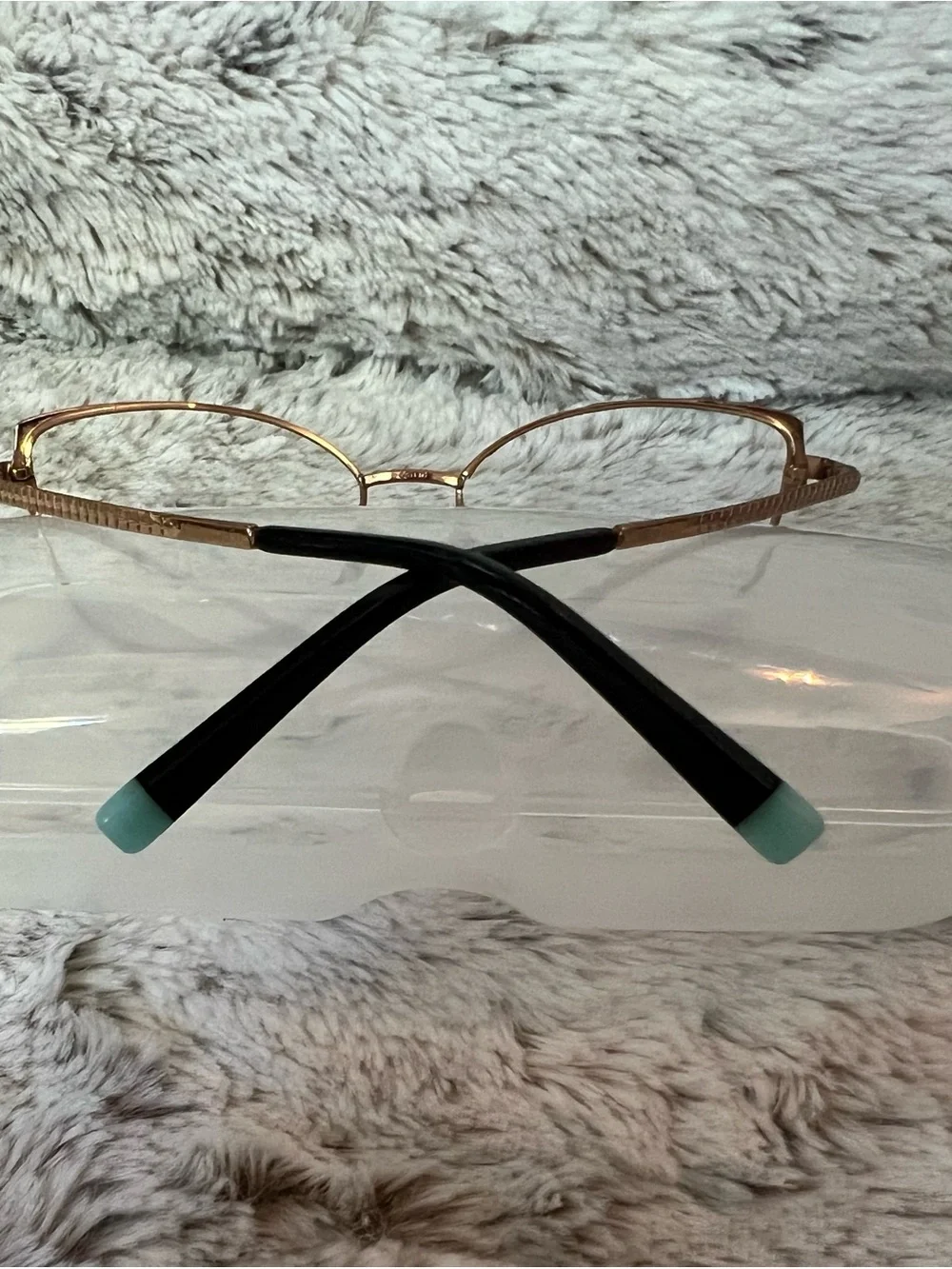 Women's Tiffany and Co gold metal and black cat eye frames